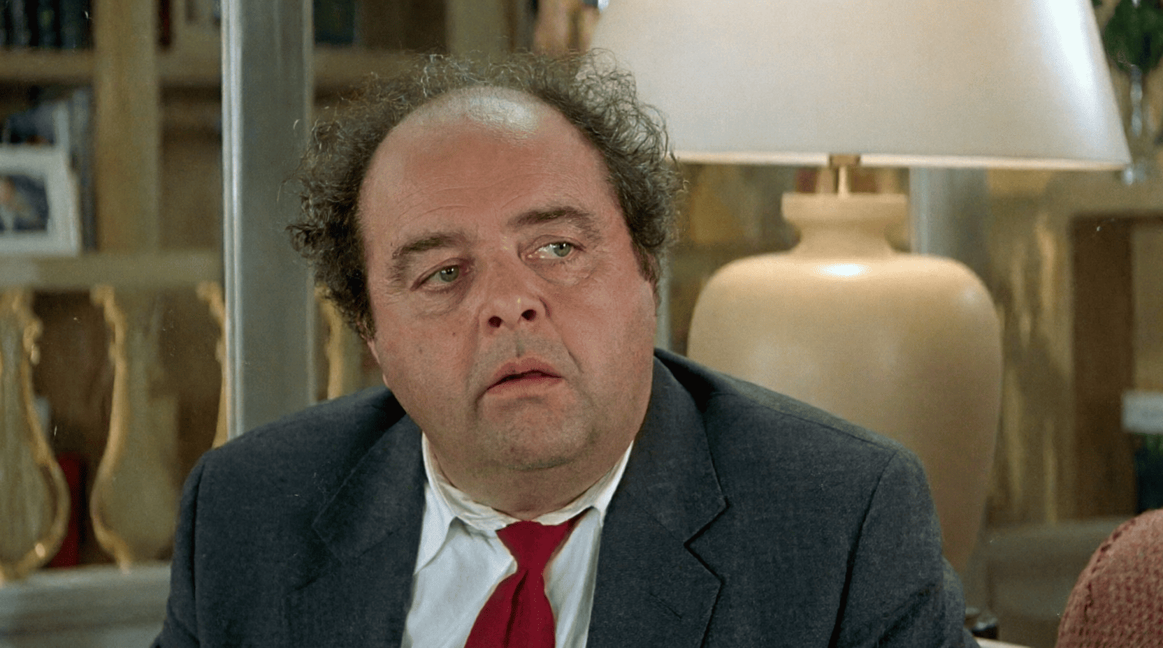 portrait-of-balding-man-with-red-tie.png