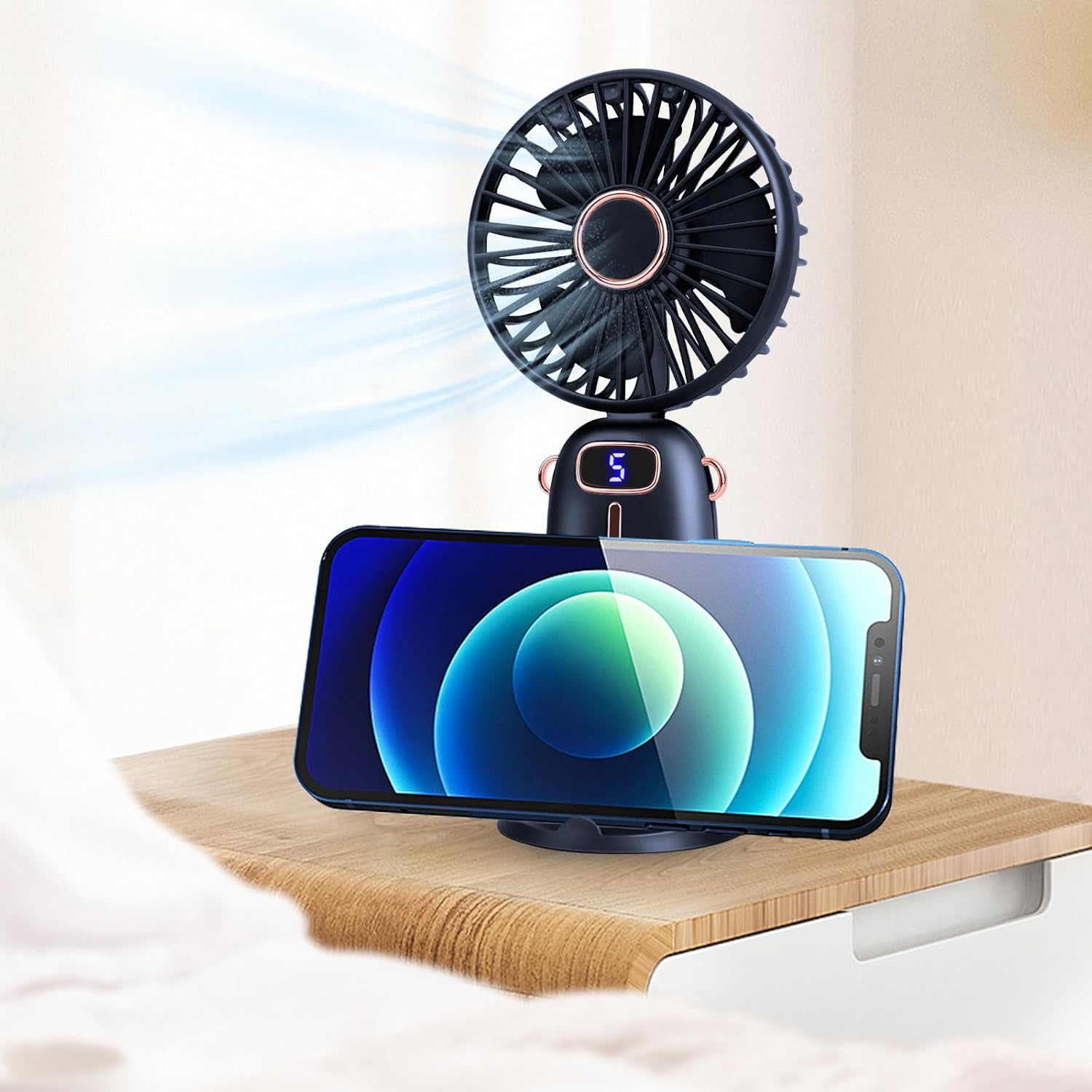Mini ventilateur portable USB KEWUZY rose et bleu – 5 vitesses, écran digital, moteur silencieux, base amovible, recharge rapide. Format de poche idéal pour les vacances, festivals ou usage personnel. Disponible à prix promo sur Amazon.