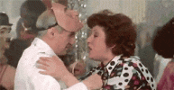 photo-man-wearing-mask-talking-to-woman.gif